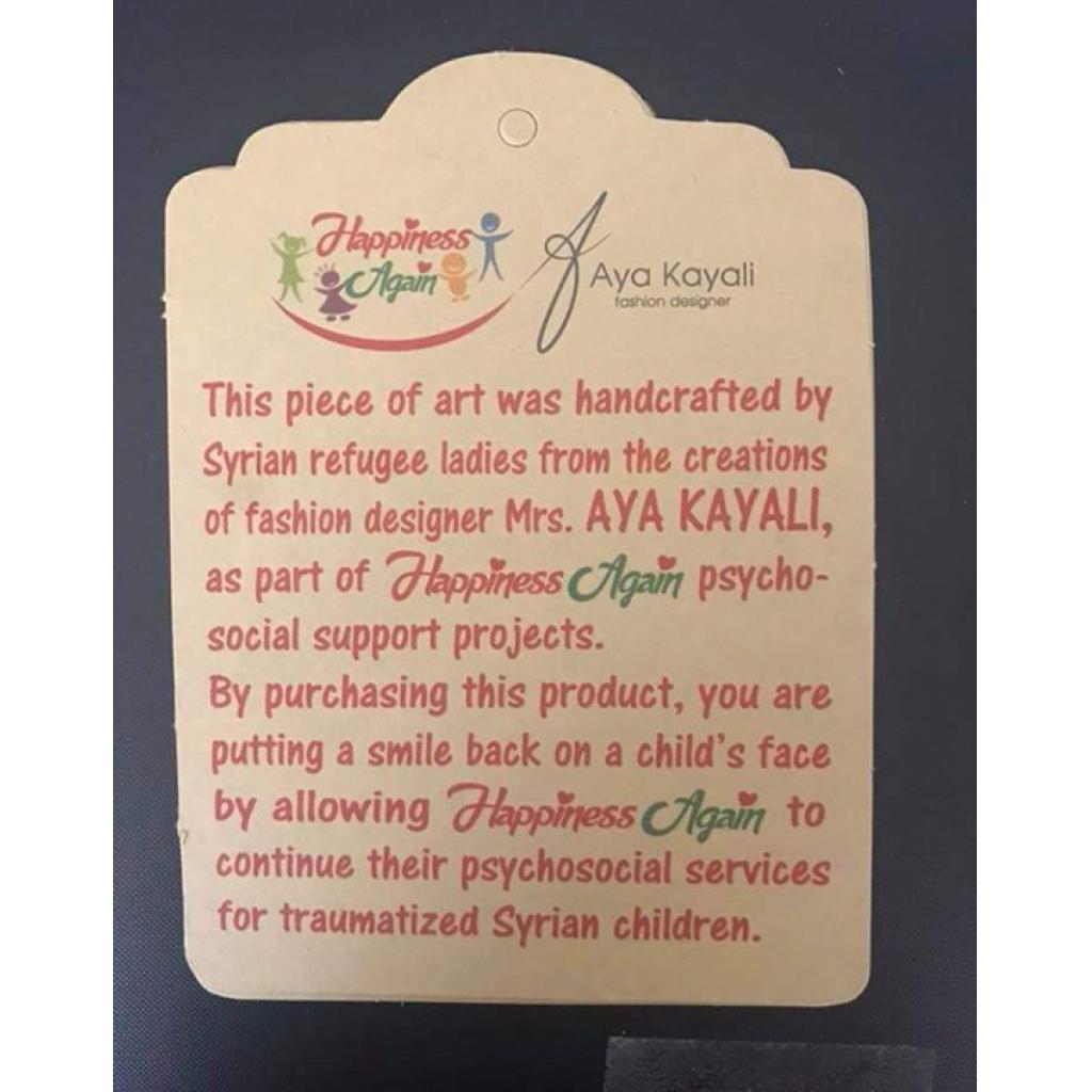 Jewelry tag for designer Aya Kayali