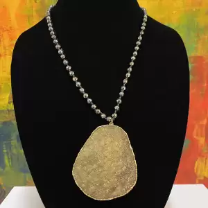 Druzy on
  Hematite Necklace by Kathy Gelfand.